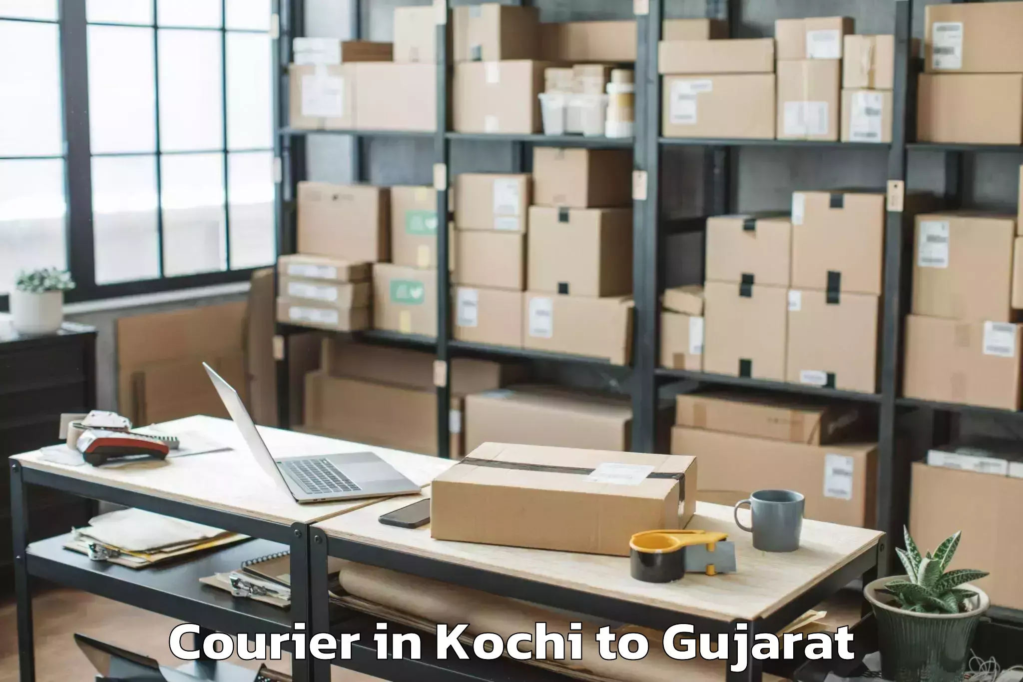 Reliable Kochi to Harij Courier